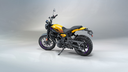Royal-Enfield-Guerrilla-450-Flash-Variant-Yellow-Ribbon-Rear-3_4-Left-View-scaled.webp